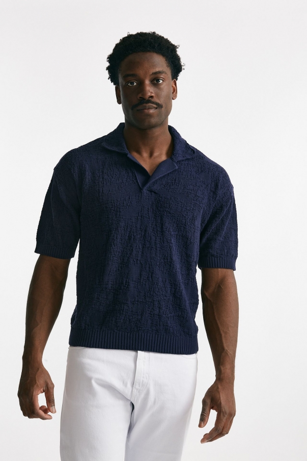 Polo lavorata in cotone blu