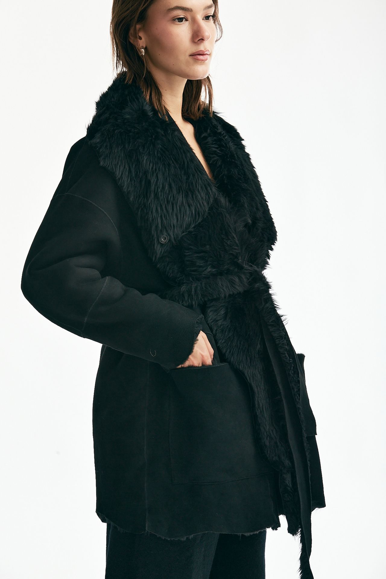 Giaccone in shearling nero