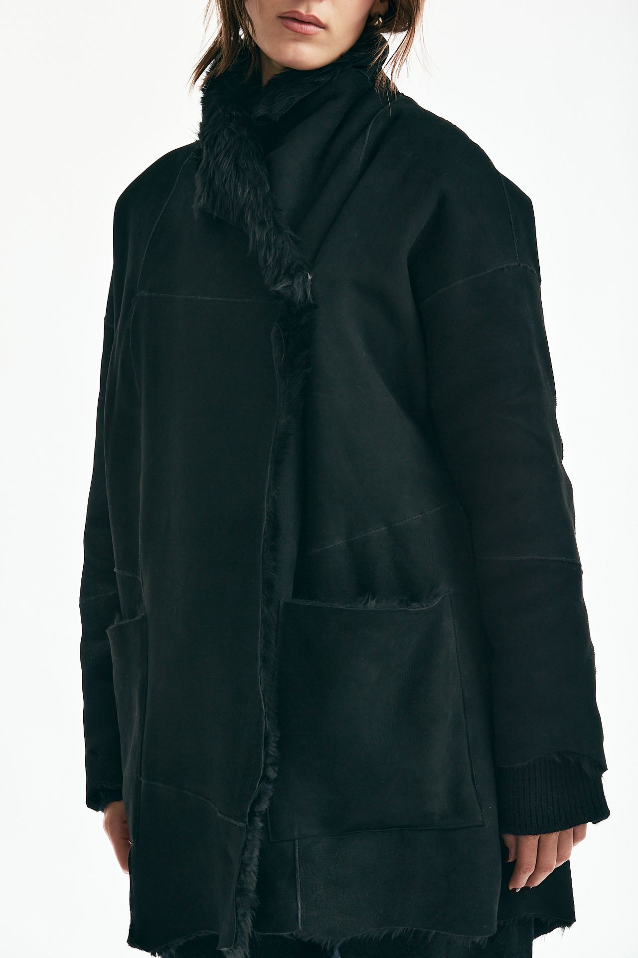 Giaccone in shearling nero