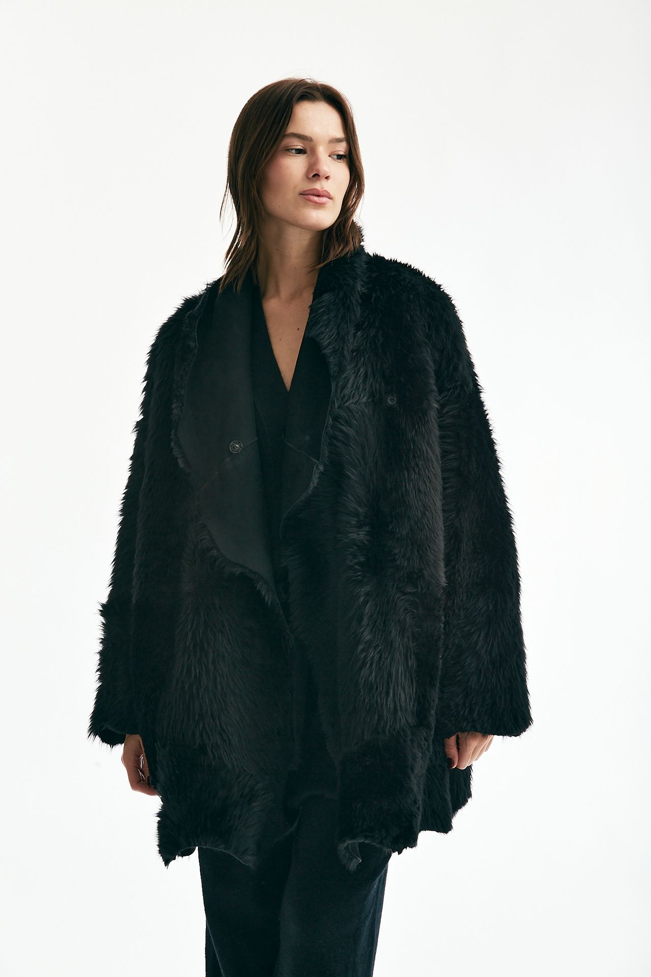 Giaccone in shearling nero