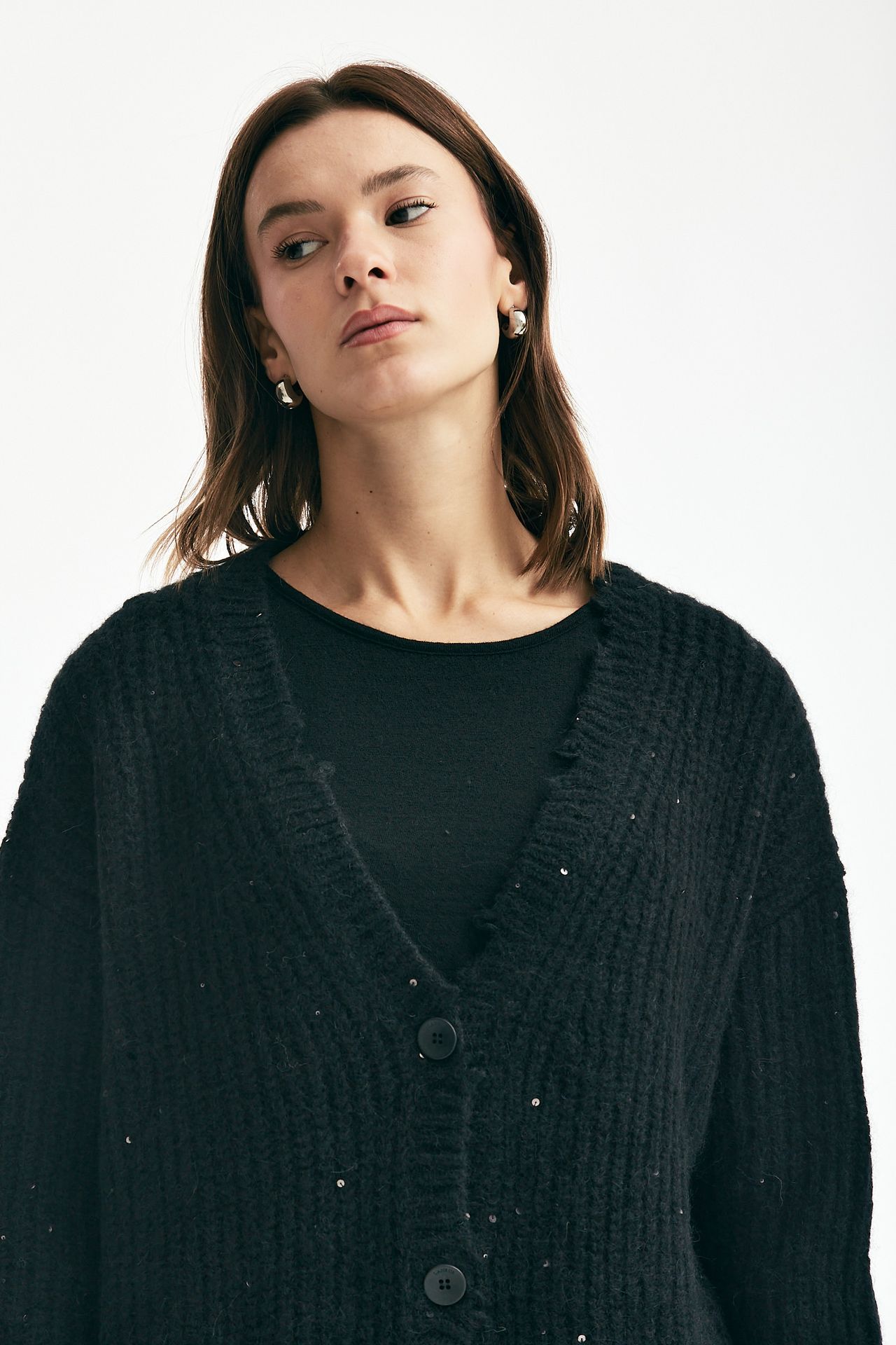 Cardigan over con pailettes nero